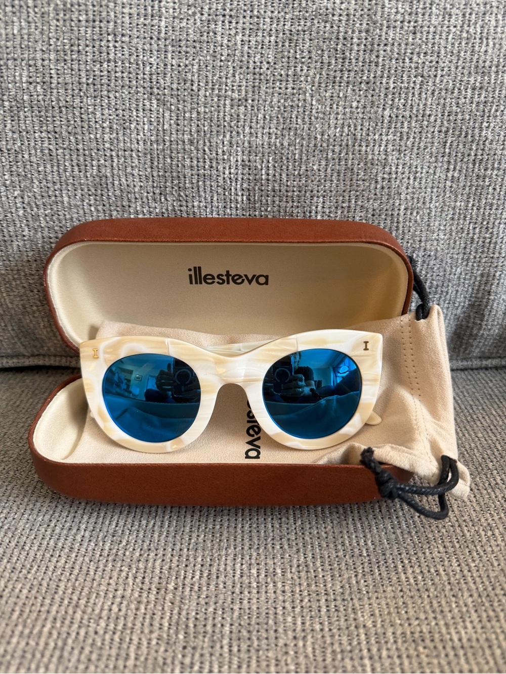 Illesteva Round White Marbled Sunglasses with Blue Mirrored Lenses